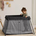 Travel Crib Light Bundle With Fitted Sheet by BabyBjorn at $349.99! Shop now at Nestled by Snuggle Bugz for Gear.