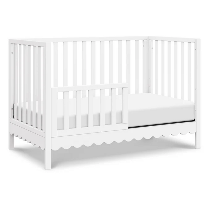 Sammy Scallop 4-in-1 Convertible Crib by DaVinci at $499! Shop now at Nestled by Snuggle Bugz for Nursery & Décor.