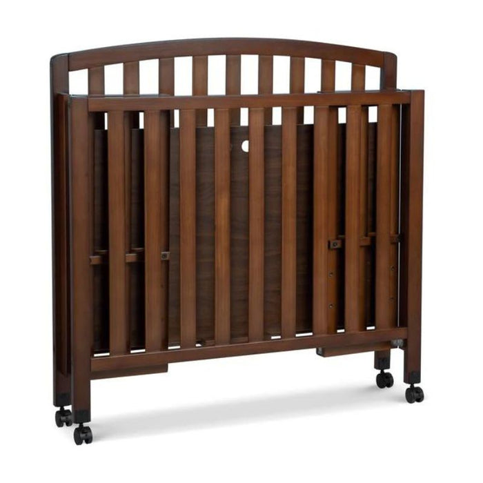 Dylan Folding Portable 3-in-1 Mini Crib by DaVinci at $299! Shop now at Nestled by Snuggle Bugz for Cribs.