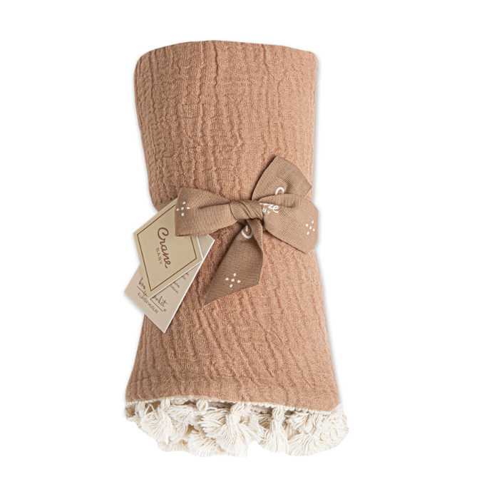 Tassel Muslin Blanket by Crane at $57.99! Shop now at Nestled by Snuggle Bugz for Nursery & Décor.