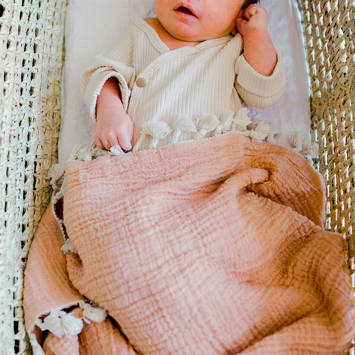 Tassel Muslin Blanket by Crane at $57.99! Shop now at Nestled by Snuggle Bugz for Nursery & Décor.