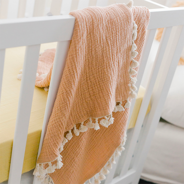 Tassel Muslin Blanket by Crane at $57.99! Shop now at Nestled by Snuggle Bugz for Nursery & Décor.